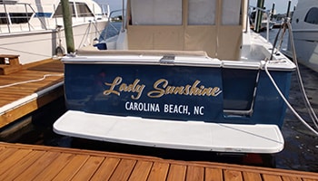 Custom boat graphics and lettering in Wilmington, NC by Southern Sign Company